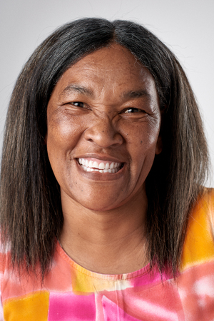 Real black african woman smiling portrait full collection of diverse facesの写真素材