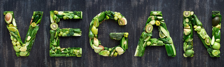 Flat lay series of food words in green produce fruit and vegetables design element poster spelling layoutの写真素材