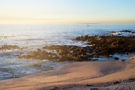 Empty beach at sunset, peaceful scenery travel lustの写真素材