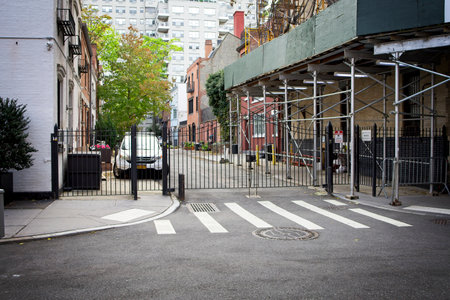 New York, NY, USA - Dec 20, 2020:  A mews named MacDougal Alley as viewed from  MacDougal Street