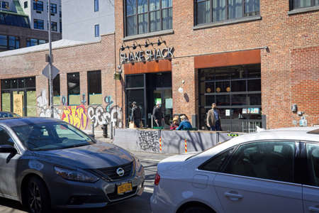 Brooklyn, NY, USA - Apr 3, 2021: Shake Shack restaurant with outside dining on Berry Street in...