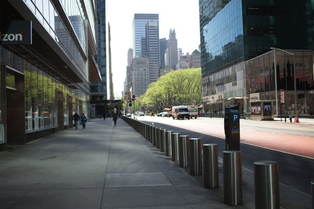 New York, NY, USA - Apr 26, 2021: Bollards along the sidewalk on West 42nd Street viewed during early morningのeditorial素材