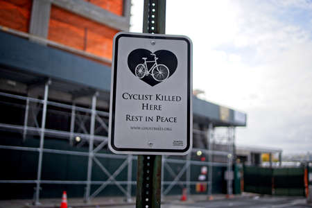 New York, NY, USA - June 21, 2021: Sign affixed to pole indicating a cyclist was killed at that locationのeditorial素材