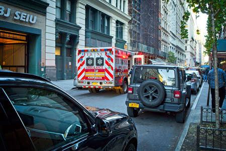 New York, NY, USA - July 5, 2021: An ambulance operated by the Fire Dept of NY (FDNY) on a call in Manhattanのeditorial素材