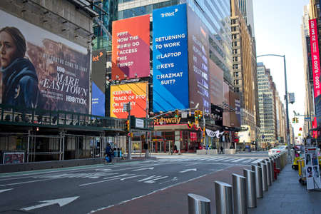 New York, NY, USA - July 14, 2021: Empty streets and sidewalks in Times Square area with appropriate billboards during height of the pandemicのeditorial素材