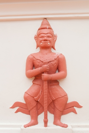 Thai style Giant standing to protect the pagodaの写真素材