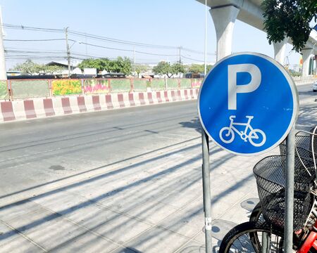 Bicycle parking near the streetの写真素材