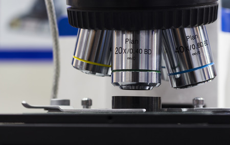 Industrial metallurgy microscope in an exhibition.Close up lens and specimen.の写真素材