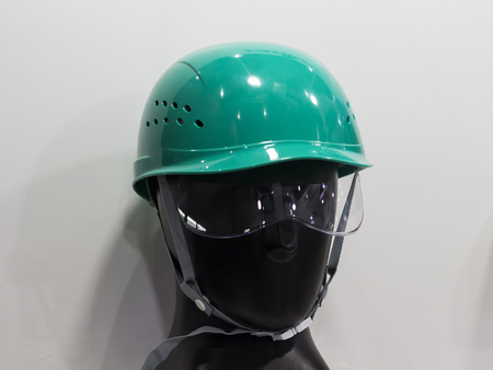 a mannequin with Safety helmets on a shelf ; Working Hard Hat;Personal Protection Equipment PPEの写真素材