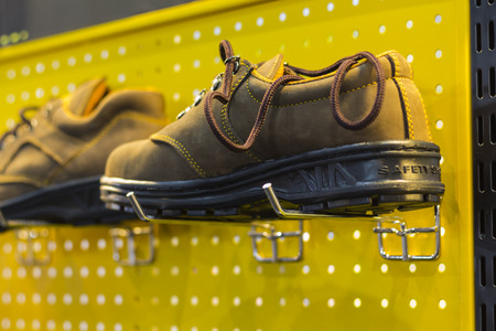 Brown Safety Shoe; protective shoe;with yellow background;selective focus
の写真素材
