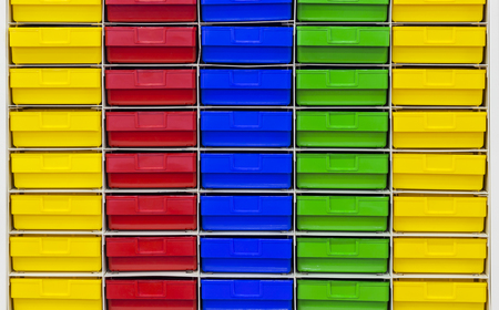 Colored plastic drawer keeping parts in workshop;storage facilityの写真素材