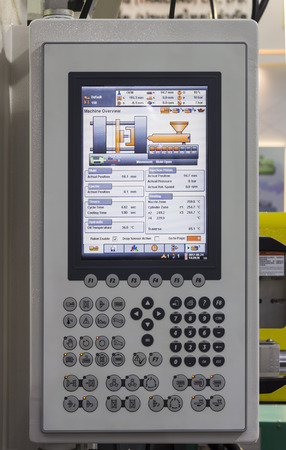 Control panel of Plastic Injection machine. Selective focus