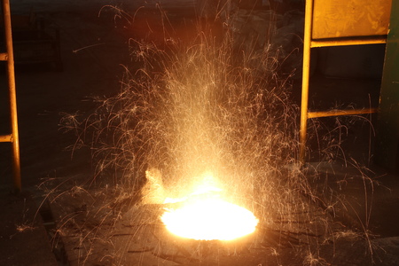 Molten metal in Induction Furnace for casting Iron manufacturing