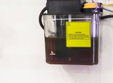 The lucbrication oil storage tank for cnc machine ; preventive  maintenance industrial backgroundの写真素材