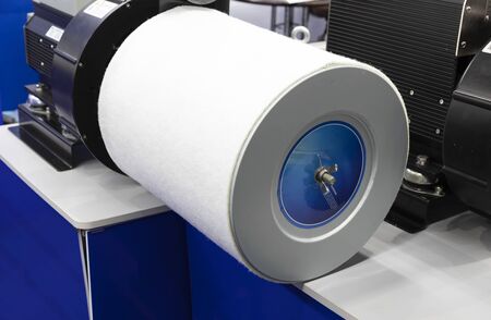 white cylinder shape Air Filter for blower motor ; industial background