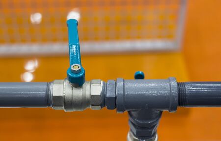 Industrial pipe valve in close position for water or pressure airの写真素材