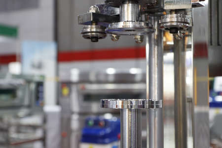 Aluminum lid packing machine for plastic can ; food industryの写真素材