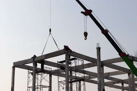 precast concrete beam installed at construction site by mobile crane  ; welding bar rod ; civil engineering backgroundの写真素材