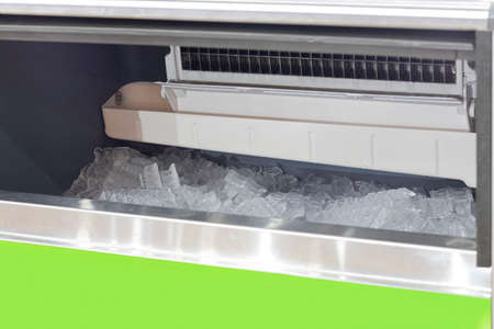 cube ice in ice making machine ; close upの写真素材
