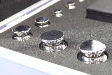 set of standard weight in box for calibration process ; quality control labの写真素材