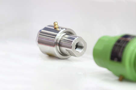 Rotary joint spare parts using for machine maintenance ; close up ; engineering equipment backgroundの写真素材