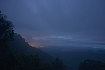 On top of the mountain at nightの写真素材