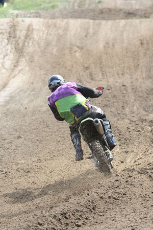 The motorcyclist makes abrupt turn on motor-race