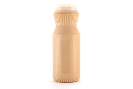 milk(tea taste) in a plastic bottle on a white backgroundの写真素材