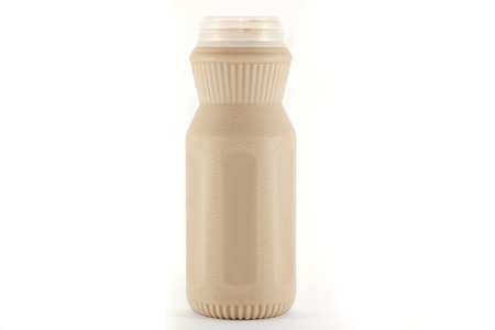 milk(coffee taste) in a plastic bottle on a white backgroundの写真素材