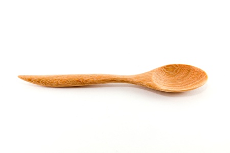 wooden spoon isolated on white backgroundの写真素材
