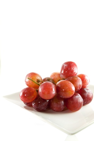 bunch of red grapes isolatedの写真素材