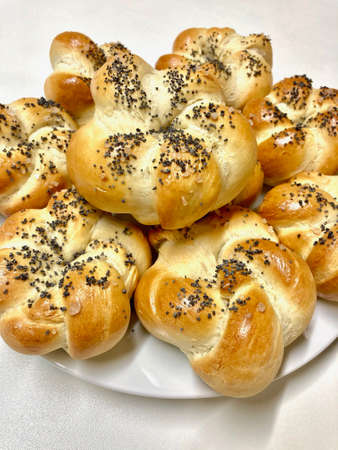 Homemade Kaiserka pastries sprinkled with poppy seeds and saltの写真素材