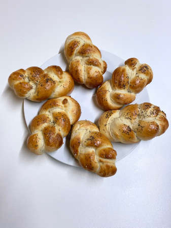Homemade buns sprinkled with poppy seedsの写真素材