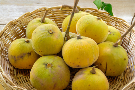Sentul fruit in wicker basket. Thai fruit.の写真素材