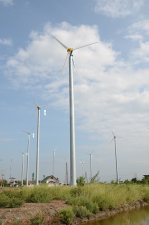Wind turbine is a machine that can receive and convert the kinetic energy of motion of the wind into mechanical energyの写真素材