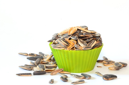 Sunflower seeds on a white backgroundの写真素材