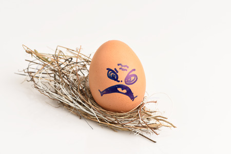 Egg art with different facial expressions.の写真素材