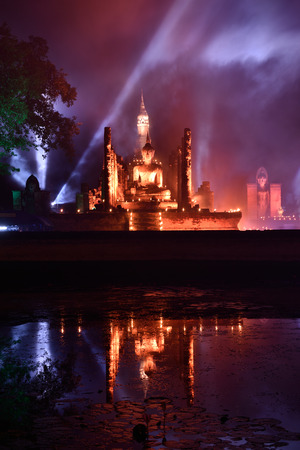 Light and sound showing in Loy Krathong festival at Mahathat temple in Sukhothai historical park, Sukhothai, Thailand.の写真素材