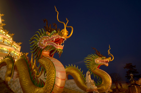 Twilight light at Chinese temple - Wat Huay pla kang (thai name) major religious attractions of Chiang Rai, Thailand.の写真素材