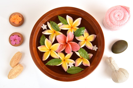 Flowers spa tub, Frangipani flowers spa tub on white background.の写真素材