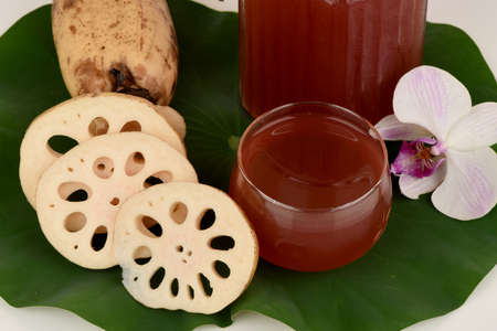 Lotus root water have medicinal properties and on a white background.の写真素材