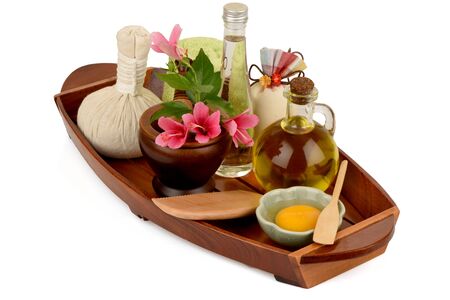 Soak hair with hibiscus flowers, egg yolks and oil for healthy hair. It has medicinal properties and on a white background.の写真素材