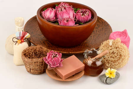 Face mask and soap made with Gaysorn extract, lotus flower and honey has medicinal properties and on a white background.の写真素材