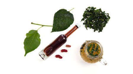 Mulberry tea and leaf isolated on white background.