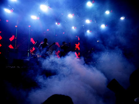 Dark and lighting background on concert stage.