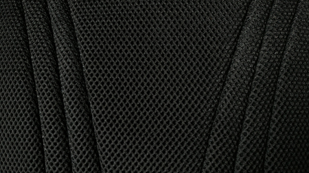 Black nylon fabric pattern texture background.