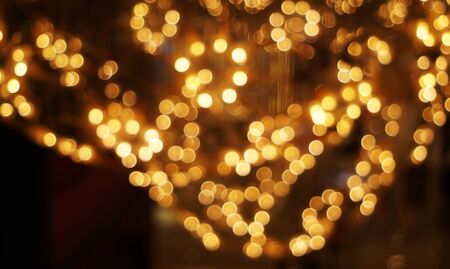 The golden bokeh blurred abstract pattern background.