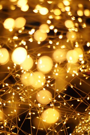 The golden bokeh blurred abstract pattern background.