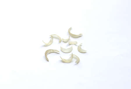 Pile of human nails isolated on white background.