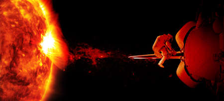 Astronaut and spaceship and sun background. Elements of this image furnishedの写真素材